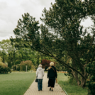women in green park